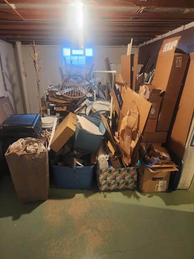 Roll-off dumpster container at job site for 4 Yard Dumpster Rental in McKenzie